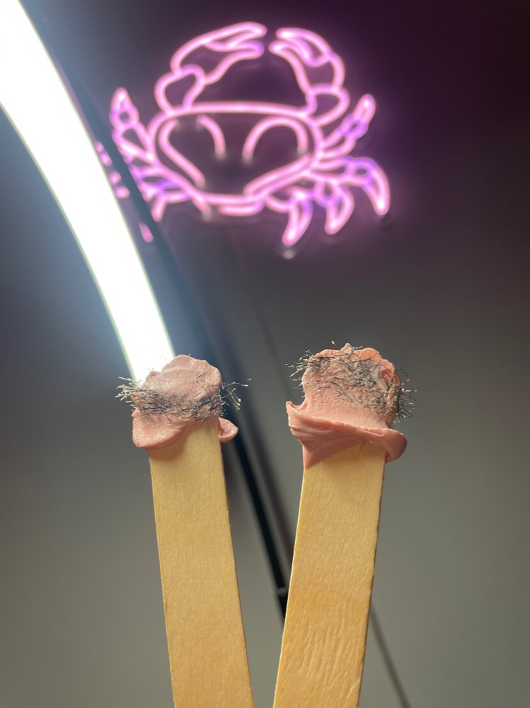 Nose wax Las Vegas: nostril hair removed on hard wax sticks at Pink Crab Wax Bar